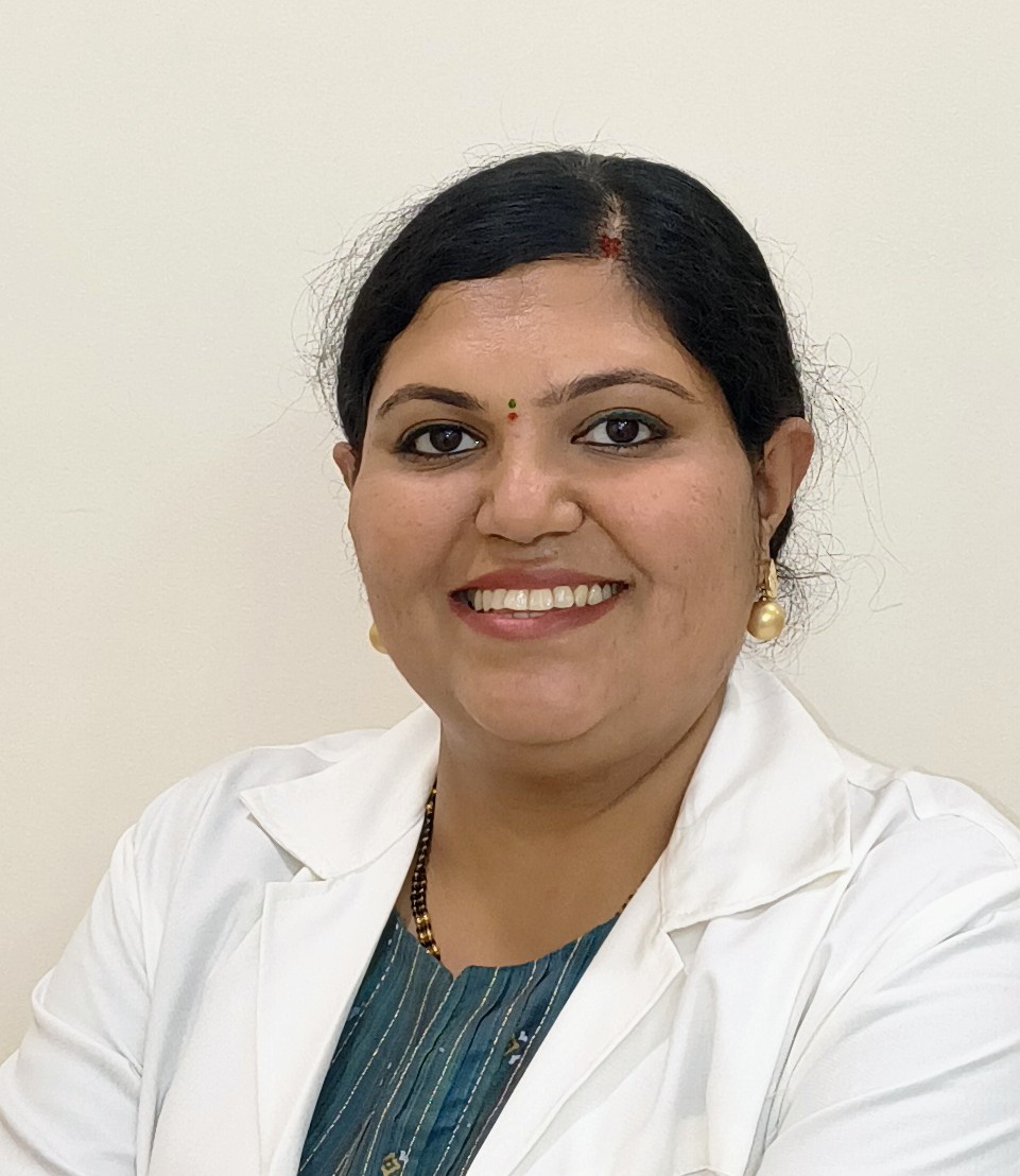 Dr.  Monisha B